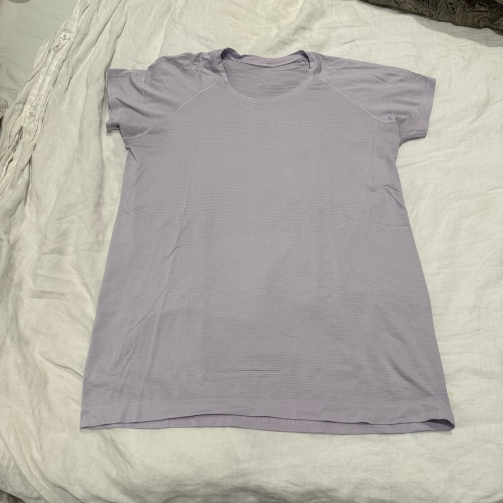 Lululemon swiftly tech short sleeve. Light purple. Size 14. Lightly worn